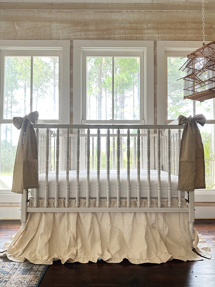 Gender neutral crib bedding set with ruffled crib skirt and two large crib bows - High Cotton Textile