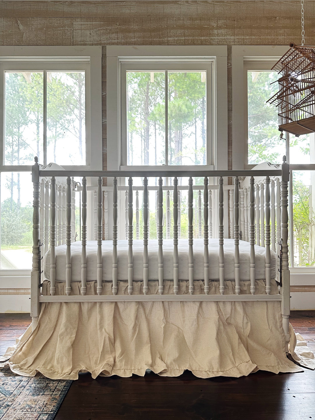 Handmade crib skirt in natural osnaburg with a linen-like washed cotton texture - High Cotton Textile