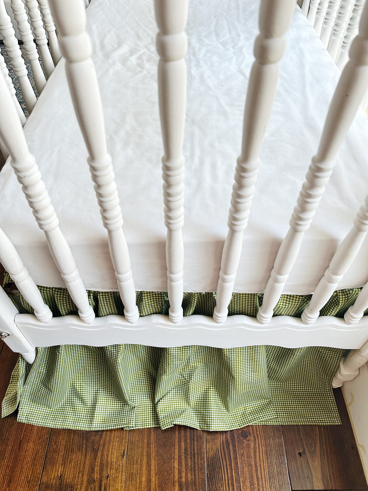 White fitted crib sheet paired with the pine green gingham gathered crib skirt