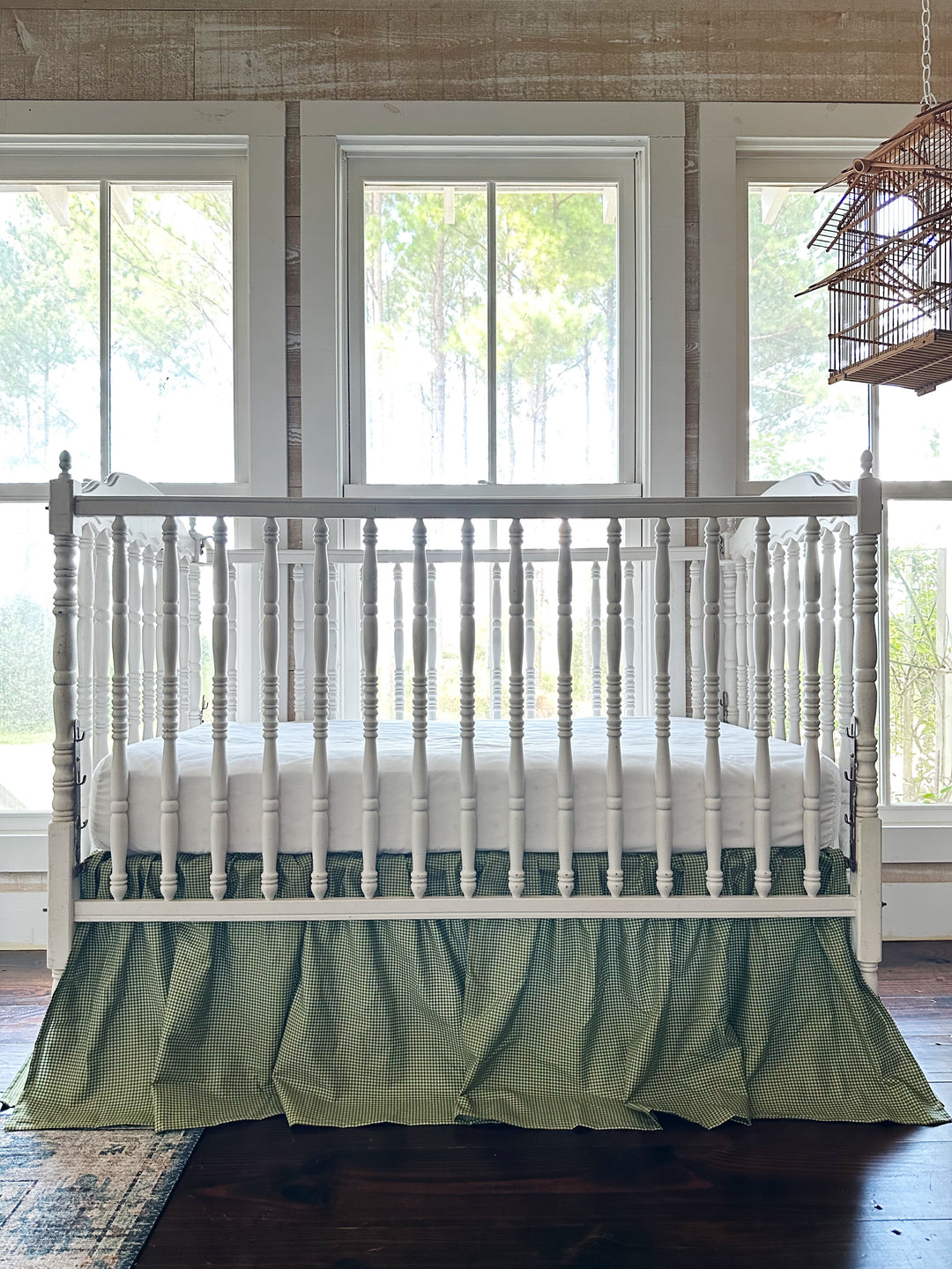 Pine green gingham farmhouse crib skirt in washed cotton, 20-inch drop, split corners