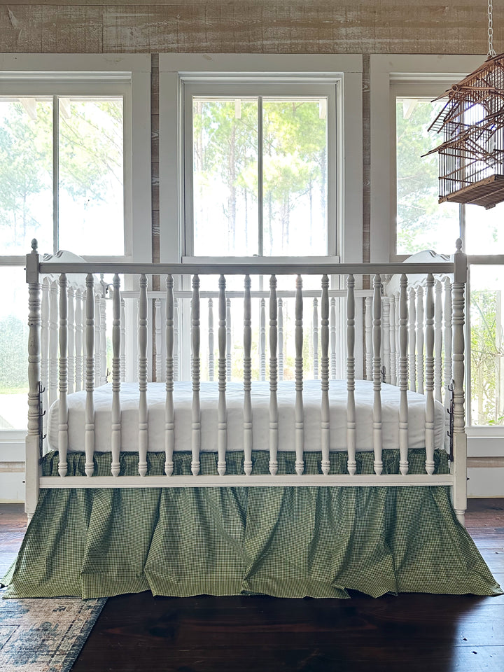 Pine green gingham farmhouse crib skirt in washed cotton, 20-inch drop, split corners