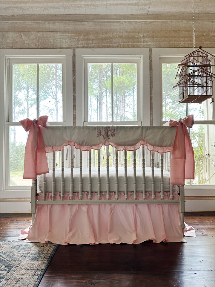 Sisters Pink baby girl crib bedding set with scalloped crib rail cover, farmhouse crib skirt and two large pink crib bows