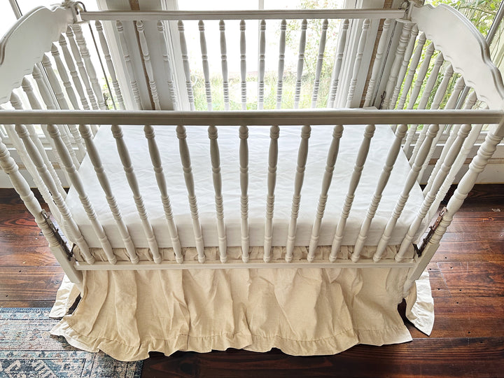 Four sided ruffled cotton crib skirt in natural osnaburg with a 22 inch finished length - High Cotton Textile