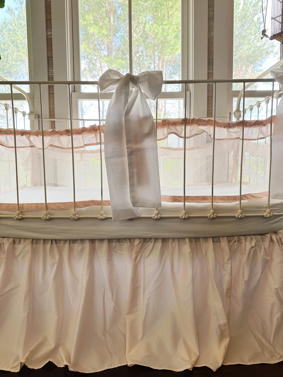 Close-up of crib liner ruffle detail