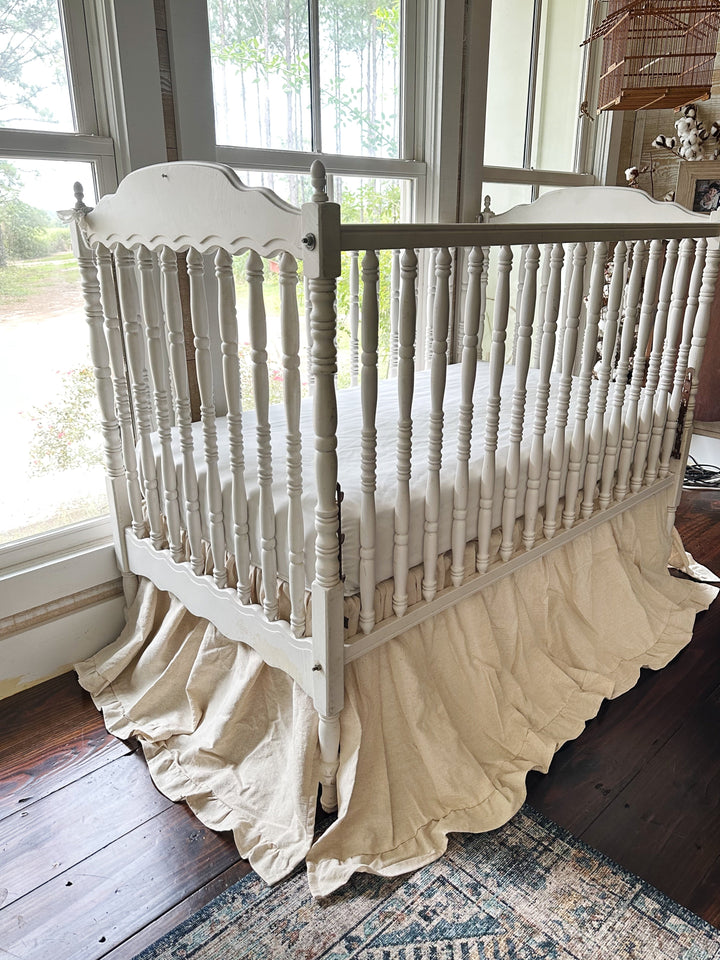 Gathered ruffle detail on a natural osnaburg cotton crib skirt - High Cotton Textile