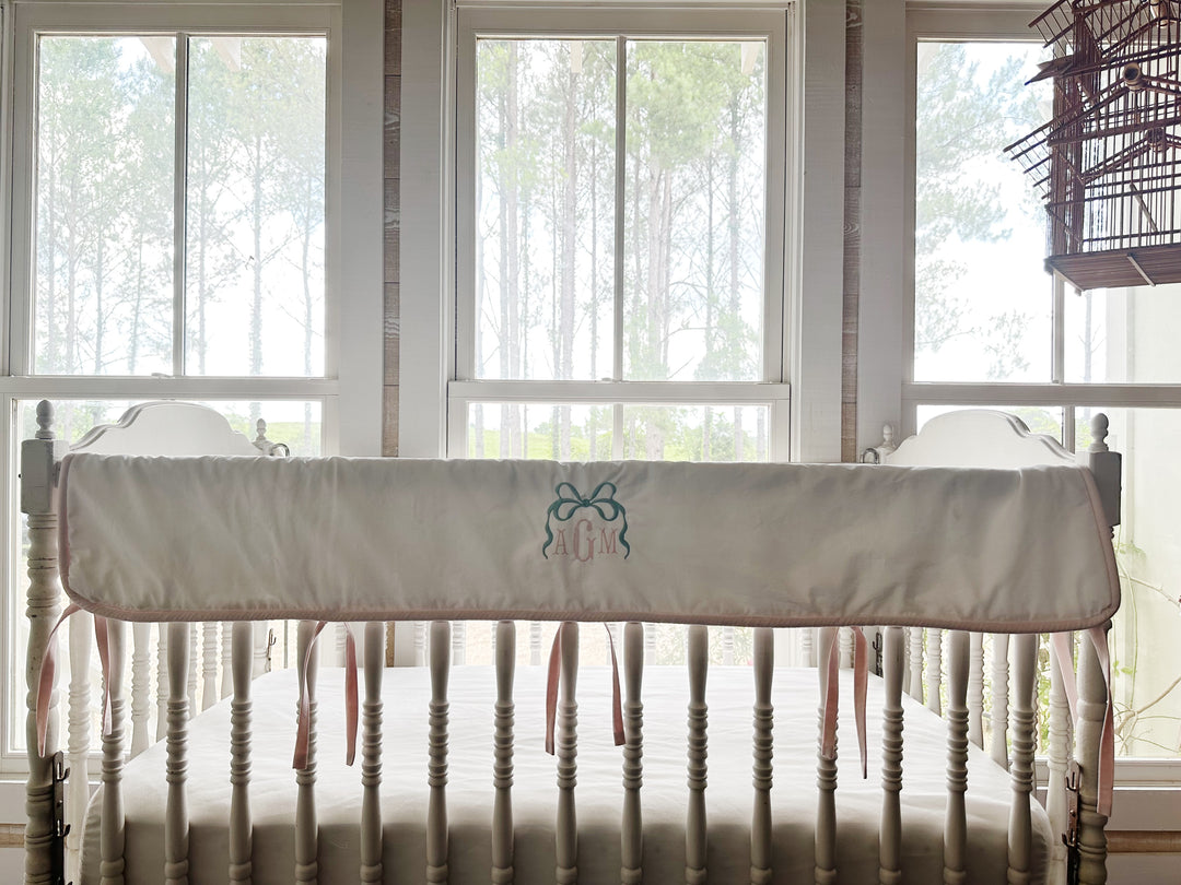 White and Baby Pink Tailored Crib Rail Cover