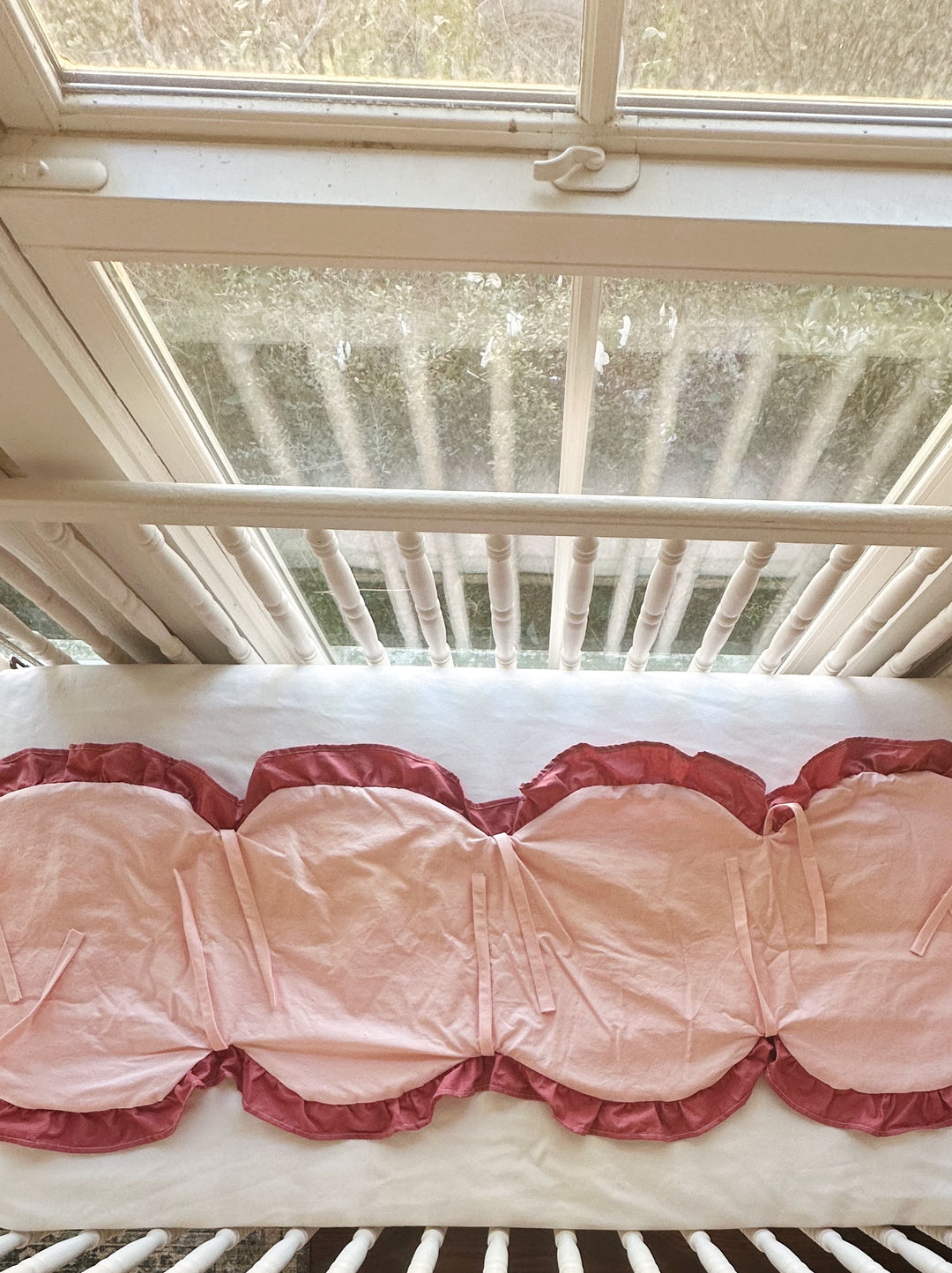 Sisters Pink and Blush rail cover laid flat, showing four scallops and the pink ties along the underside