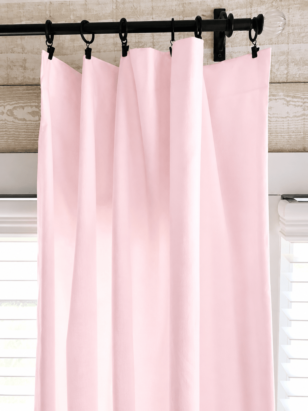 Close view of the baby pink farmhouse curtain heading on iron clip rings, showing the clean flat edge with no ruffle - High Cotton Textile