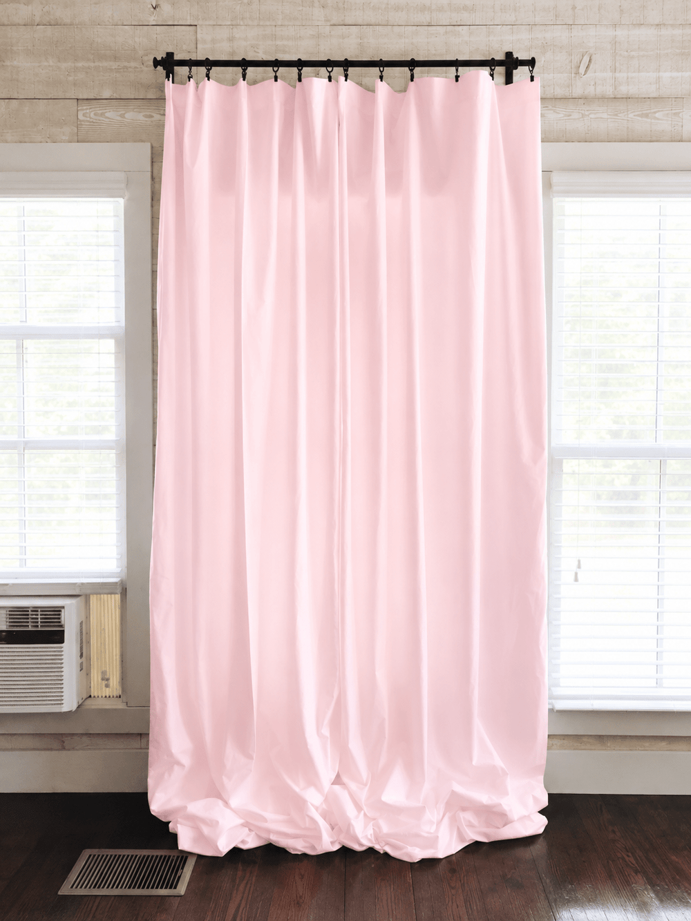 Baby pink farmhouse curtain panels drawn closed across a window, the full length shown from rod to floor - High Cotton Textile