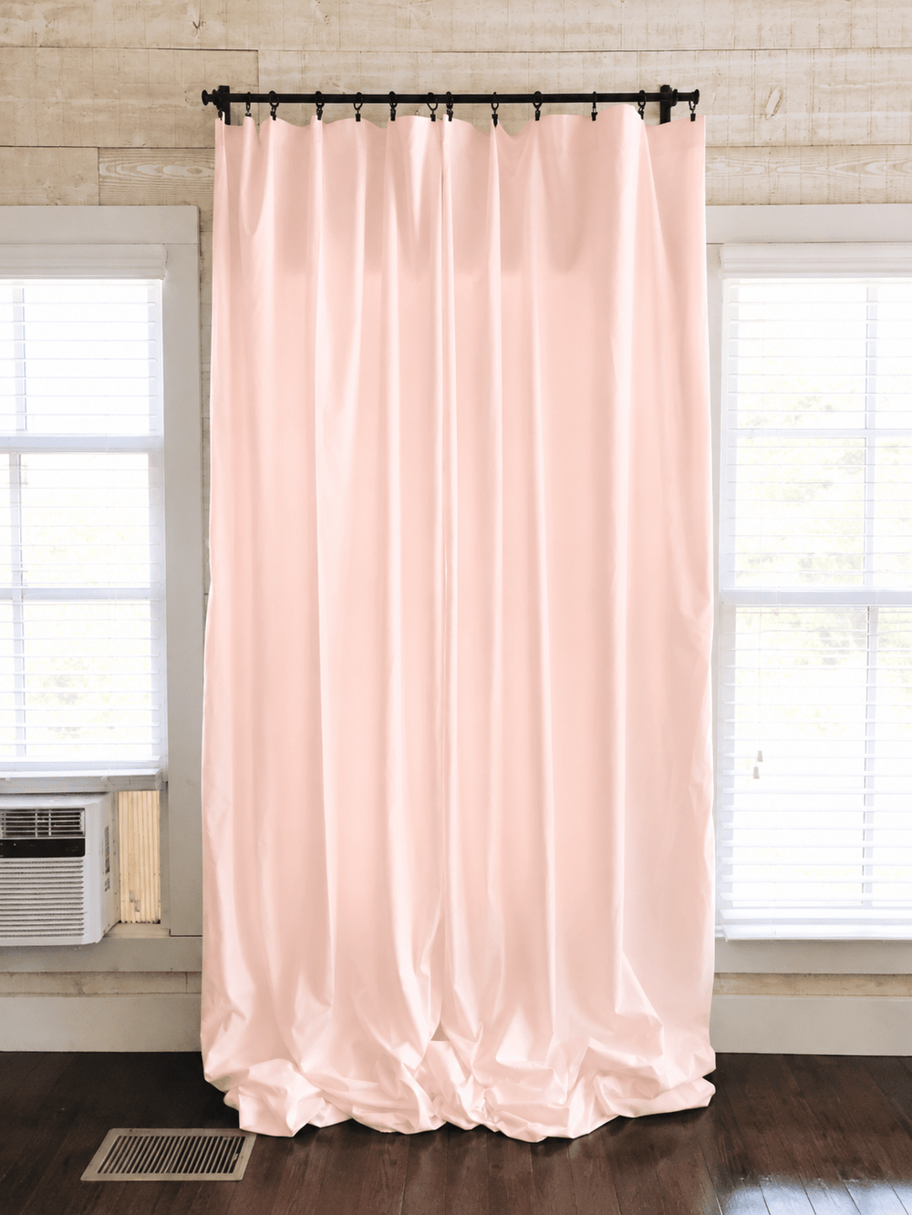 Ballet Slipper Pink farmhouse curtain panels drawn closed across a window, full length from rod to floor - High Cotton Textile