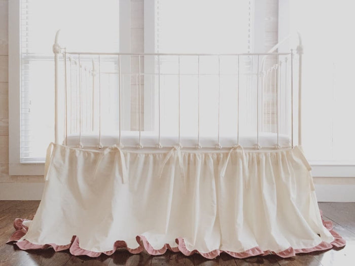 Ivory and blush tie-on adjustable crib skirt in washed cotton