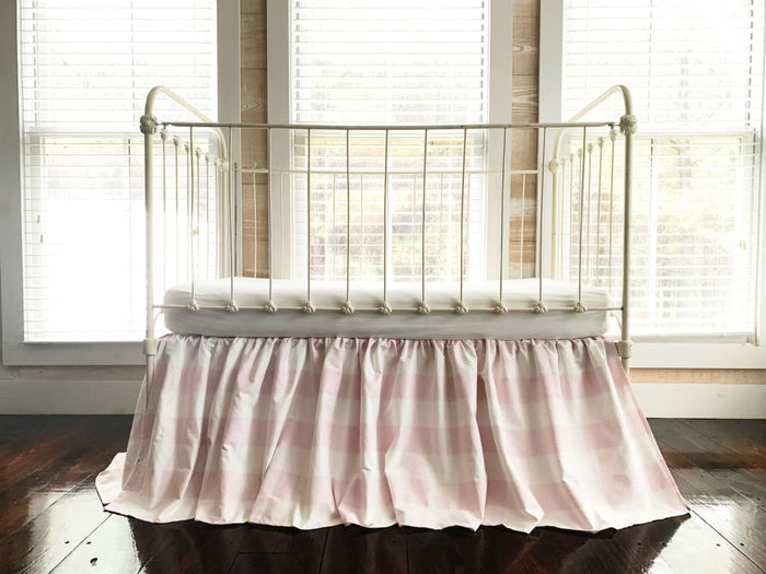 Pink buffalo check farmhouse crib skirt in washed cotton, 20-inch drop, split corners