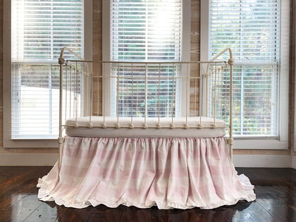 Pink buffalo check ruffled crib skirt in washed cotton, 22-inch drop, gathered
