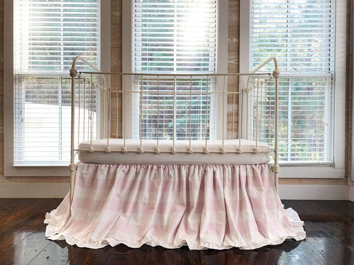 Pink buffalo check ruffled crib skirt in washed cotton, 22-inch drop, gathered