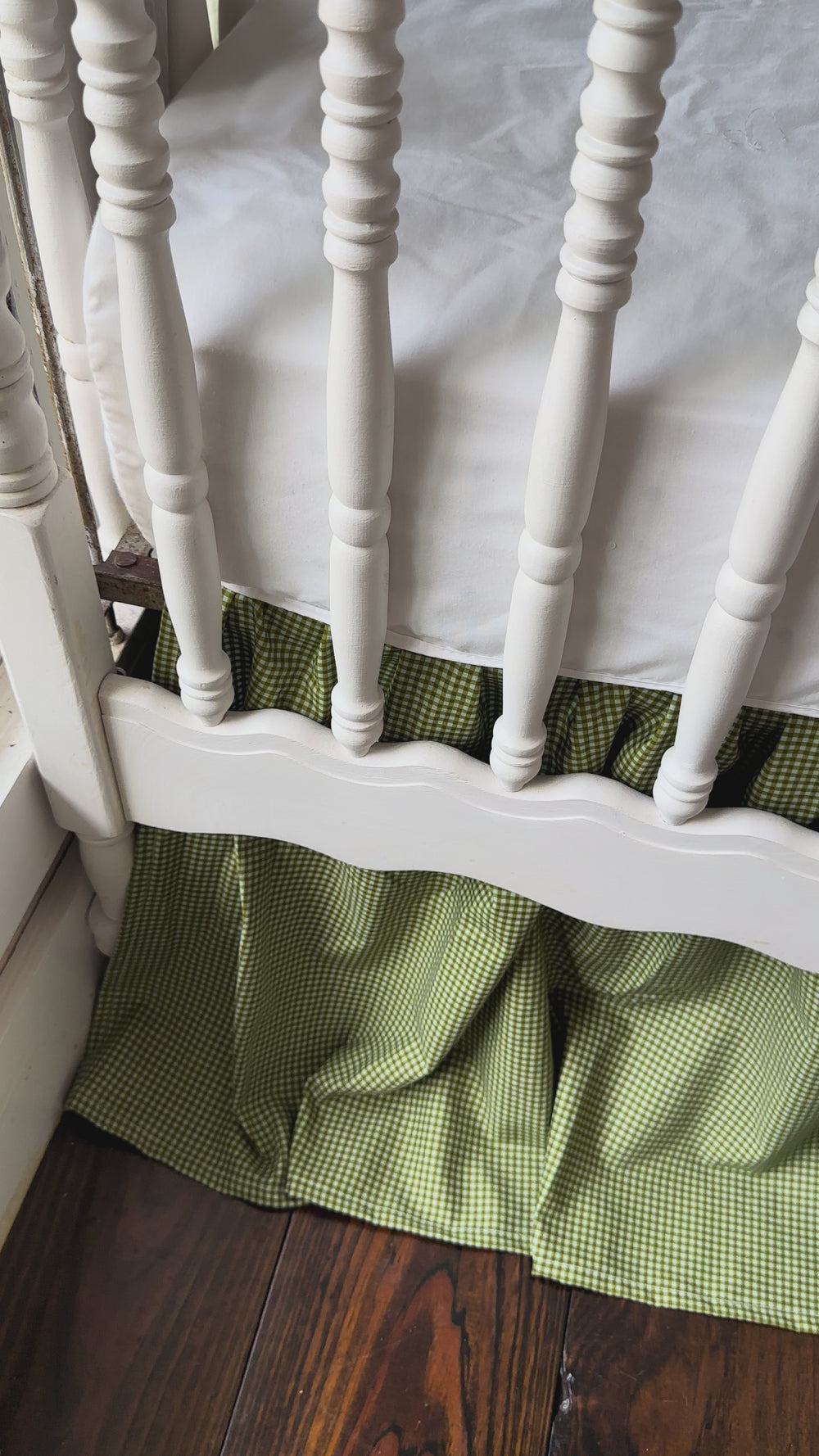 Video of the pine green gingham farmhouse crib skirt with two large crib bows