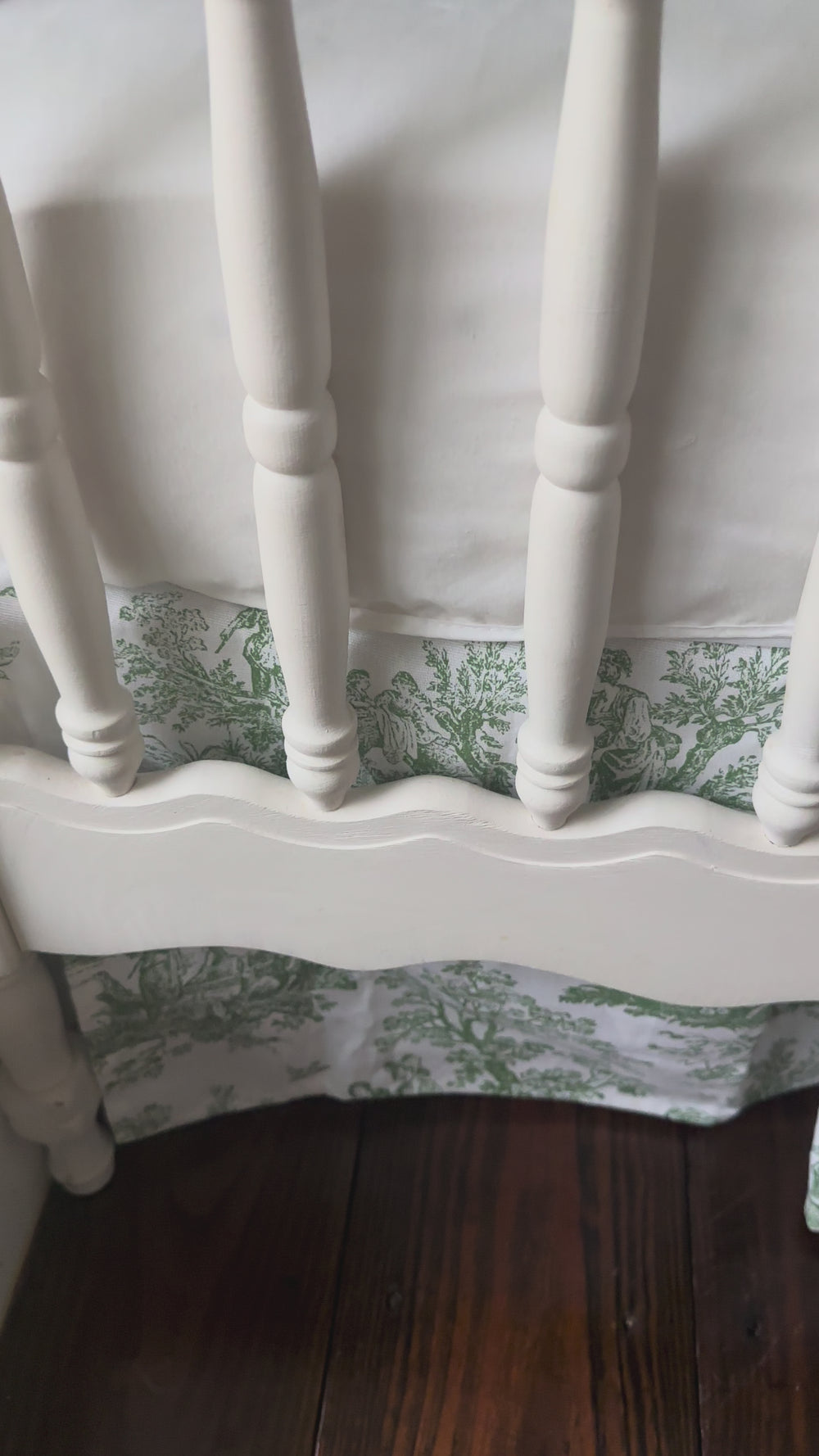 Video of a cypress green toile crib bedding set on a white crib