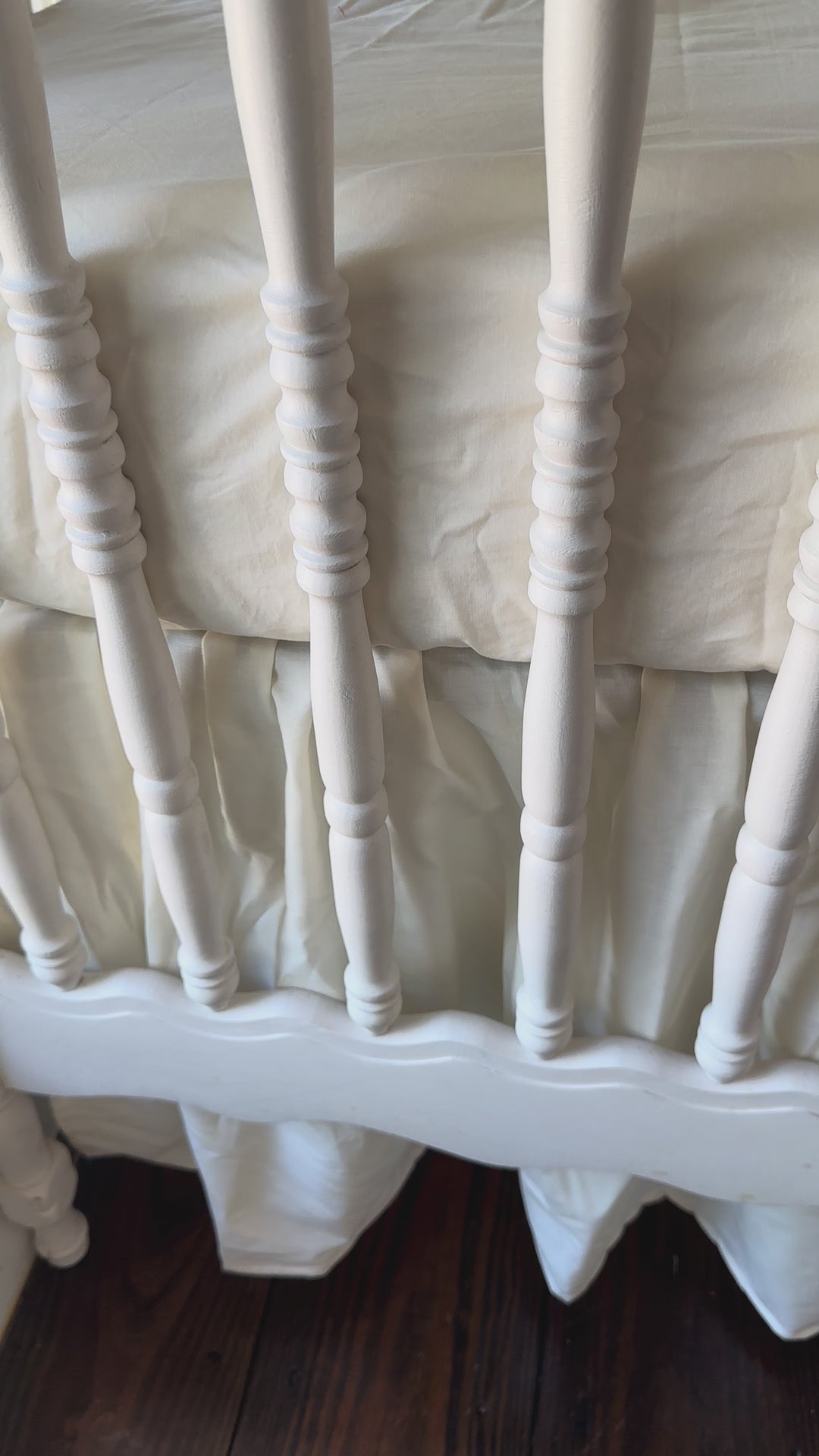 Walking video of the Ivory Ruffled Crib Rail Cover & Farmhouse Skirt Set in the nursery