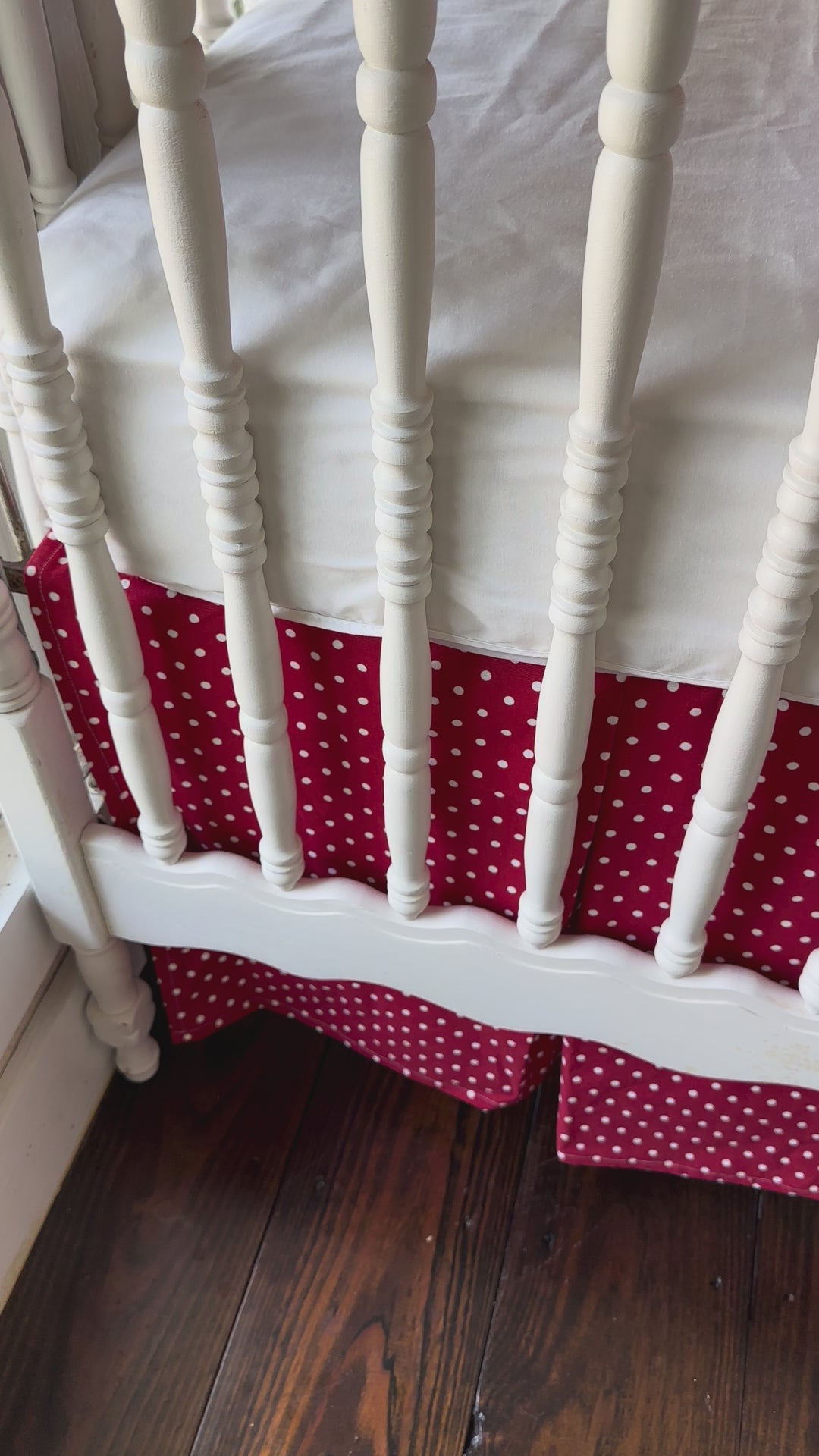 Walking video of the red polka dot ruffled rail cover, matching dotted tailored skirt and two white sashes