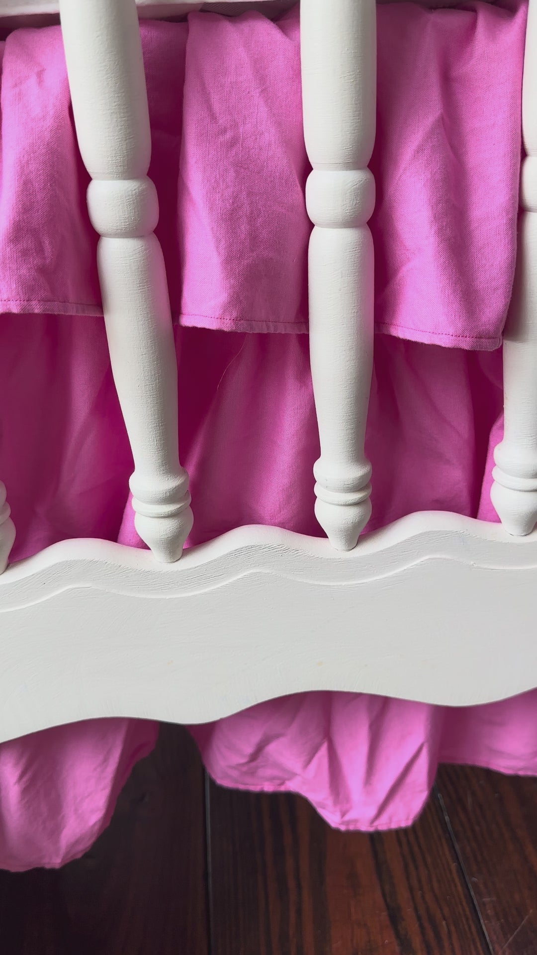 Walking video of the Parfait Pink Tiered Ruffled Cotton Crib Skirt in the nursery