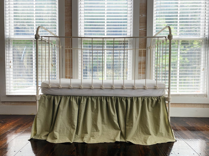 Sage green farmhouse crib skirt in washed cotton, 20-inch drop, gathered