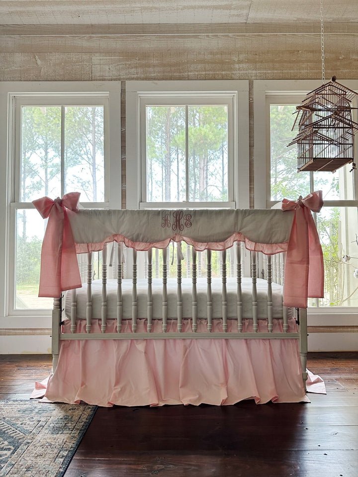 Sisters Pink baby girl crib bedding set with scalloped crib rail cover, farmhouse crib skirt and two large pink crib bows