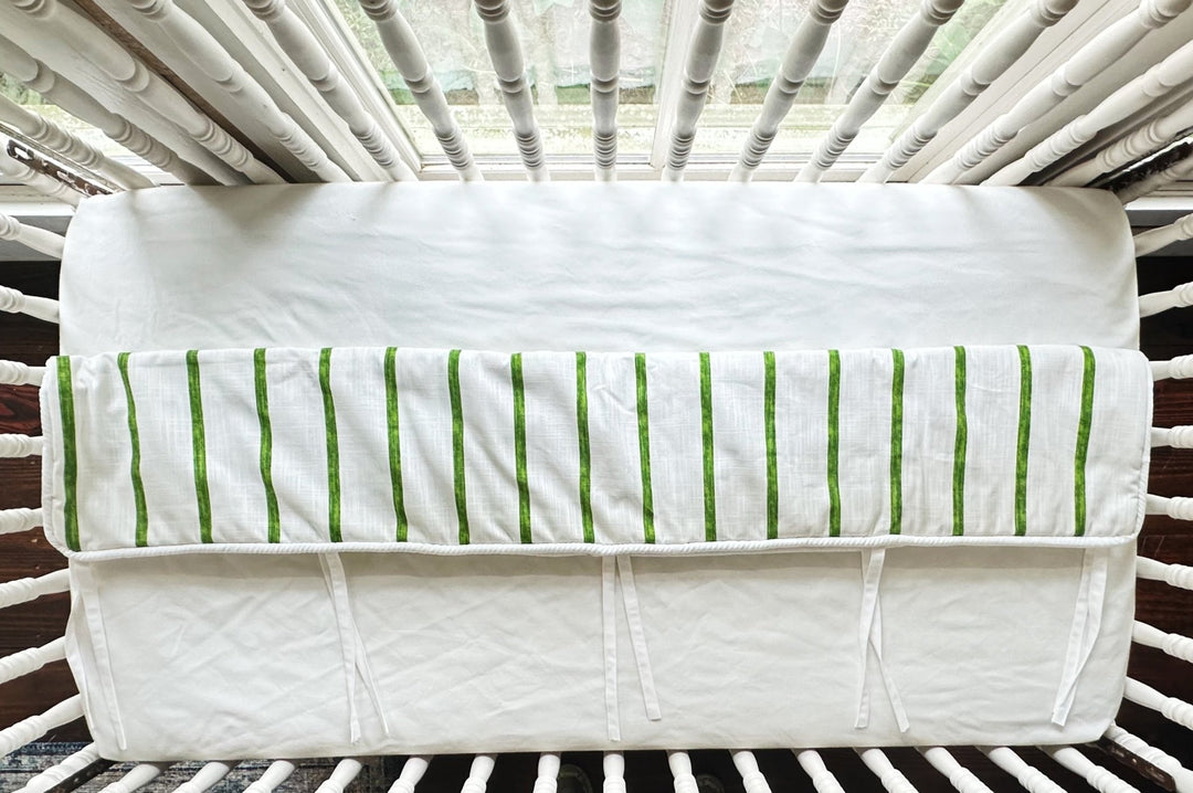 Looking straight down at the striped panel and the white lining with its slim fabric ties