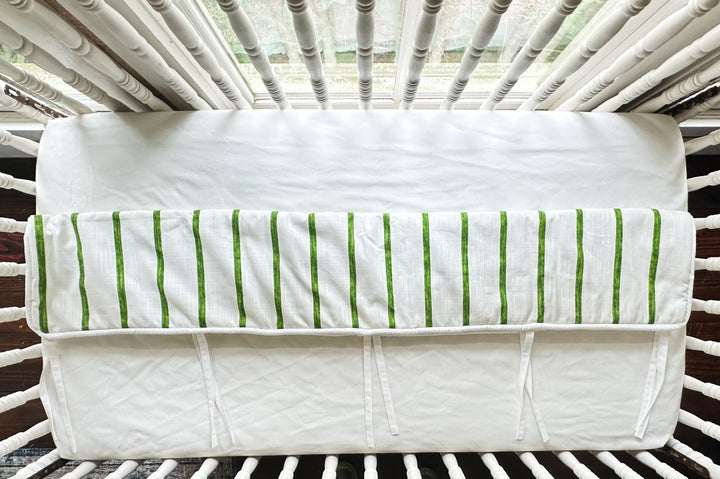 Looking straight down at the striped panel and the white lining with its slim fabric ties