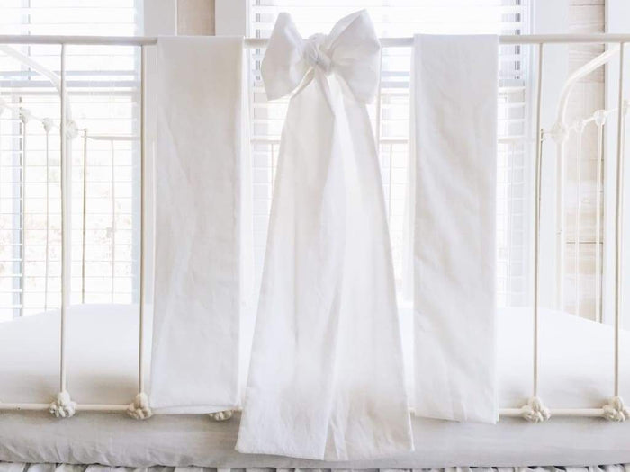 Large white washed cotton crib bow sash
