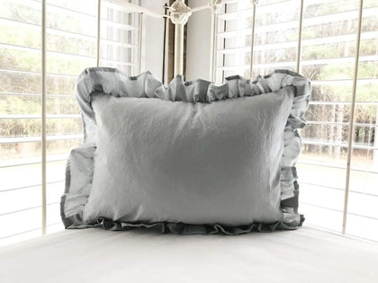 Zen grey ruffled crib pillow in washed cotton