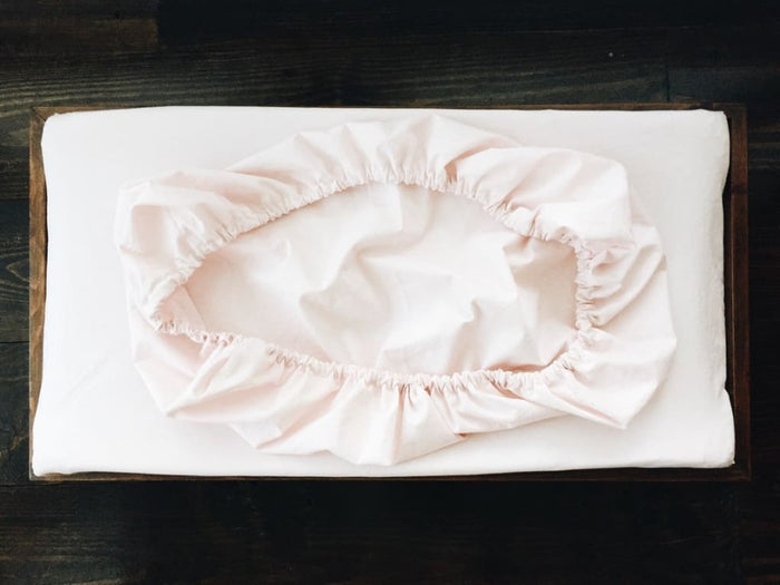 Baby pink fitted changing pad cover in washed cotton