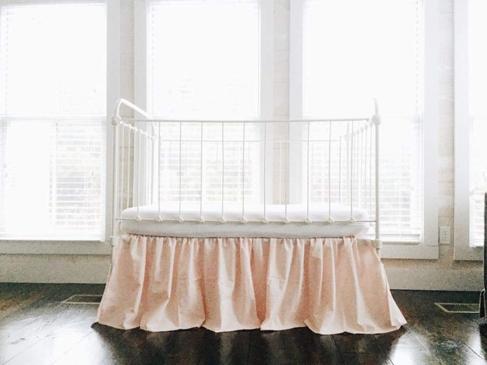 Ballet slipper pink farmhouse crib skirt with a 20-inch drop