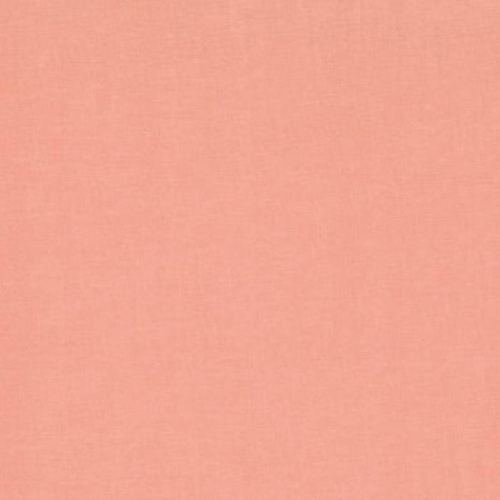 Coral washed cotton fabric swatch