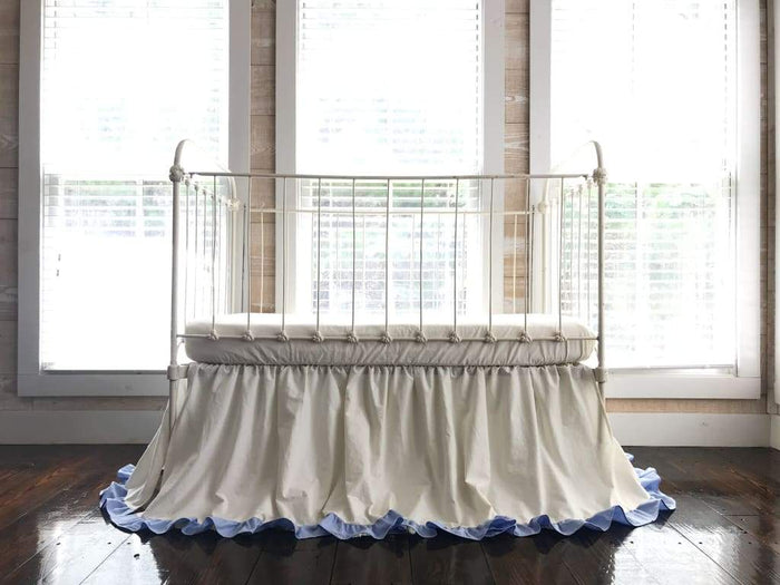 Ivory and baby blue ruffled crib skirt in washed cotton, 22-inch drop, gathered