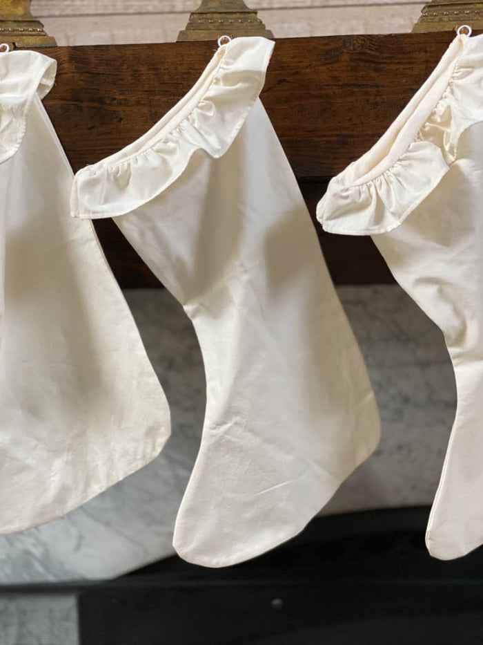 Ivory ruffled farmhouse Christmas stockings in washed cotton
