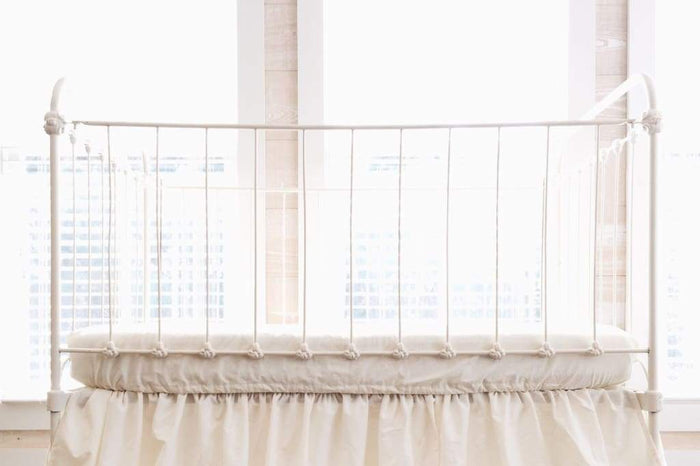 Ivory fitted crib sheet in washed cotton, 28 by 52 inches