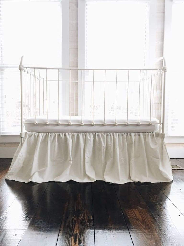 Porcelain farmhouse crib skirt in washed cotton, 20-inch drop with split corners