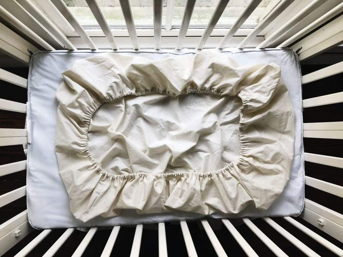 Porcelain fitted mini crib sheet in washed cotton, 24 by 38 inches