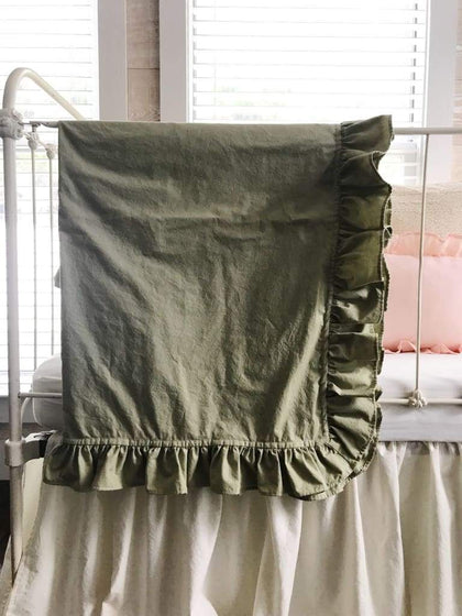 Sage green ruffled crib blanket in washed cotton, about 34 by 42 inches