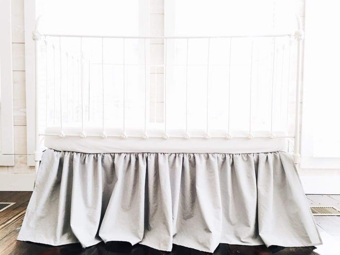 Silver grey farmhouse crib skirt in washed cotton, 20-inch drop with split corners
